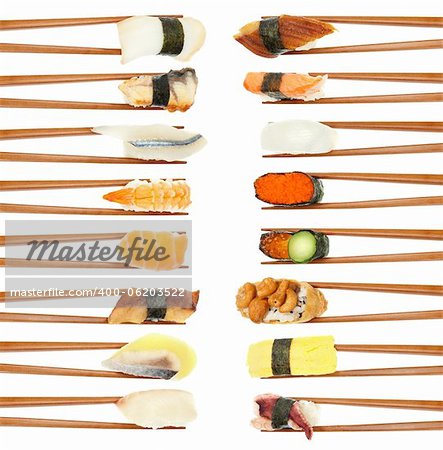 16 different types of sushi being held up in in two vertical rows with wooden chopsticks isolated on white.
