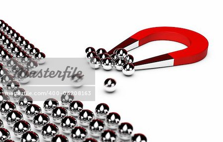 red horseshoe magnet attracting some chrome balls from a crowd, white background