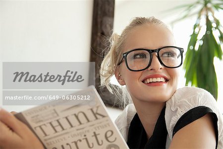 Teenage girl writing in journal