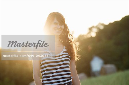 Smiling woman walking outdoors