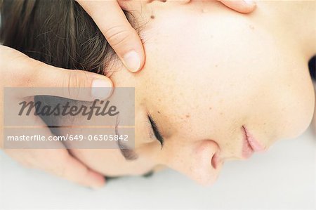 Close up of woman having scalp massage
