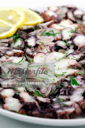 Squid carpaccio with herbs and lemon