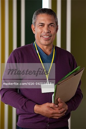 Man holding files, portrait