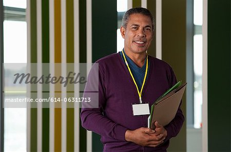 Man holding files, portrait