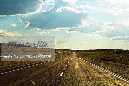 Driving on open road, Wyoming, USA