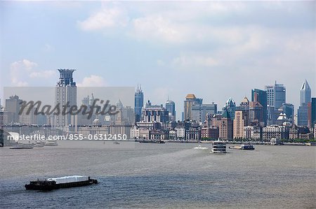 Skyline of the Bund viewed from cruiser on Huangpu River, Shanghai, China