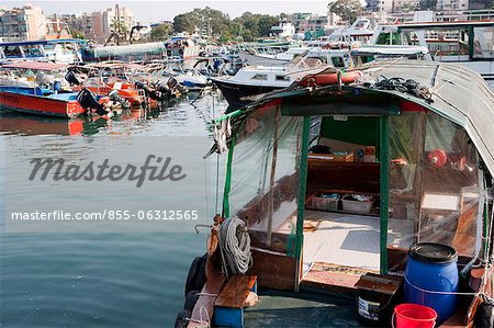 Fishing boats and yachts anchoring by the pier, Sai Kung, Hong Kong