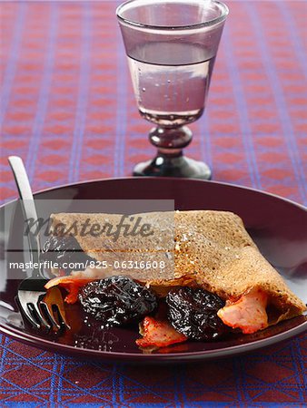 Buckwheat pancake with prunes and bacon