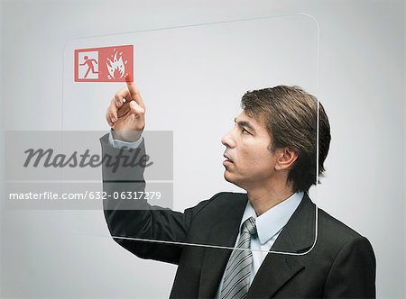 Businessman using advanced touch screen technology