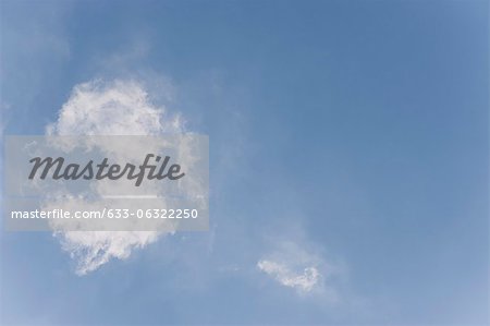 Wispy clouds in blue sky