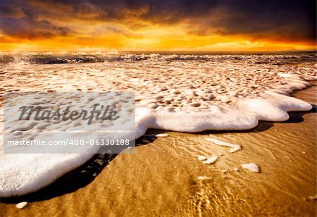Waves splashing onto the sand