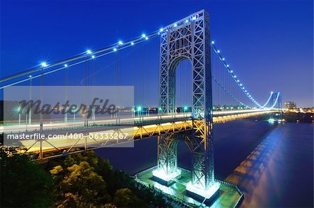 The George Washington Bridge spans the Hudson River from Fort Lee, New Jersey to the Washington Heights neighborhood in the borough of Manhattan in the city of New York, New York.