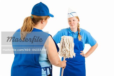 ...but somebody's got to do it.  Boss hands teen worker a mop to clean up a mess.  Isolated on white.