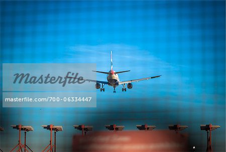 Plane Landing at Heathrow Airport, London, UK Plane Landing at Heathrow Airport, London, UK