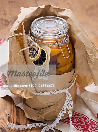 Jar with preserved orange slices