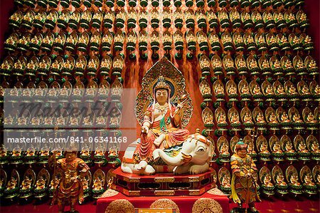 Wall of gold statues at the Buddha Tooth Relic Museum in Chinatown, Singapore, Southeast Asia, Asia
