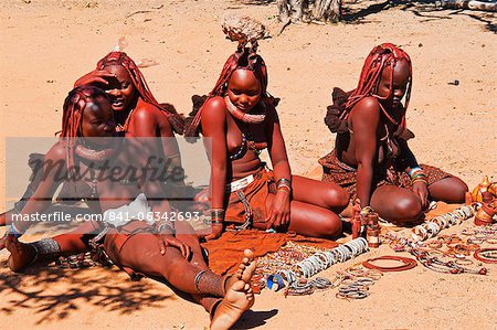 Himba women selling souvenirs, Kaokoveld, Namibia, Africa