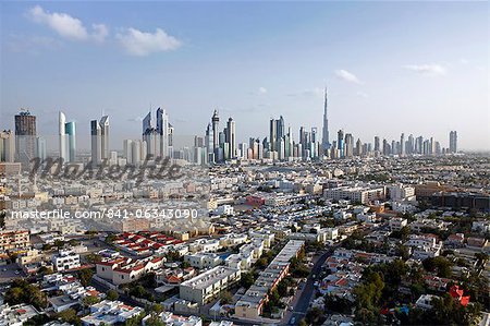 Elevated view of the new Dubai skyline of modern architecture and skyscrapers including the Burj Khalifa on Sheikh Zayed Road, Dubai, United Arab Emirates, Middle East
