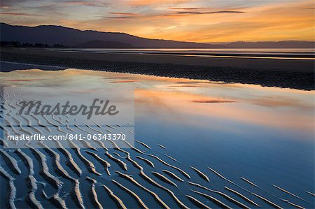 Ripples of sand on Pohara Beach at sunset, Golden Bay, South Island, New Zealand, Pacific
