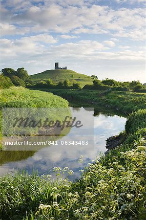 River Tone meandering towards Burrow Mump and the ruined church on its summit, Burrowbridge, Somerset, England, United Kingdom, Europe