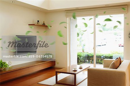 Modern Living Room Interior And Floating Green Leaves