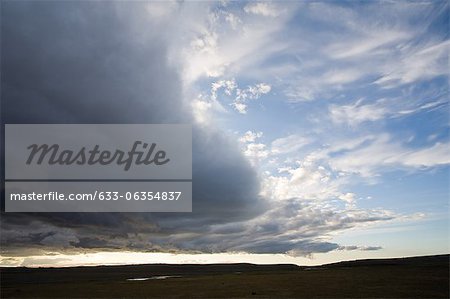 Dramatic clouds over barren landscape, Sprengisandur region, Iceland