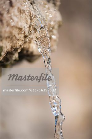 Water flowing over rock, close-up