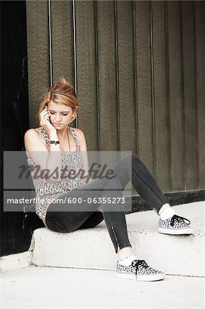 Teenager using Cell Phone, Mannheim, Baden-Wurttemberg, Germany