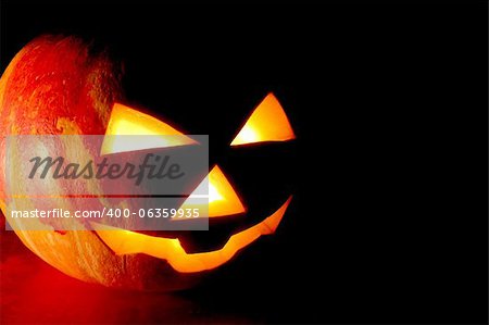 pumpkin for Halloween with a track of blood-stained palm