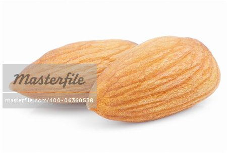 Closeup of two almond nuts isolated on white