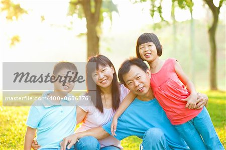 Attractive Asian Family Outdoor Lifestyle