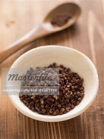 close up of a bowl of szechuan pepper