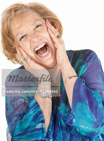 Blond elderly woman yelling with hands on her cheeks