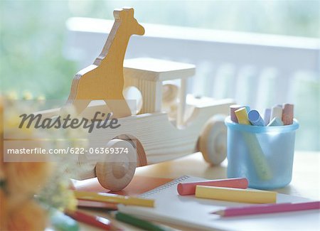 Wooden toys and crayons