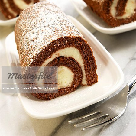 Individual Cream Filled Pumpkin Roll Dusted with Powdered Sugar