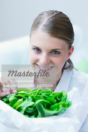 A girl holding lettuce A girl holding lettuce