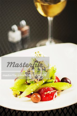 Greek Horiatiki Salad with a Glass of White Wine Greek Horiatiki Salad with a Glass of White Wine