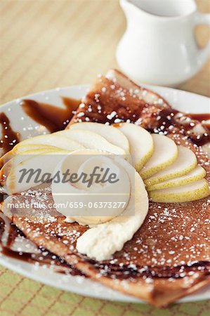 Crepe with Apple Slices, Caramel Sauce and Ice Cream