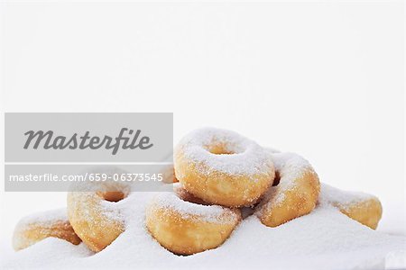 Doughnuts in a pile of sugar