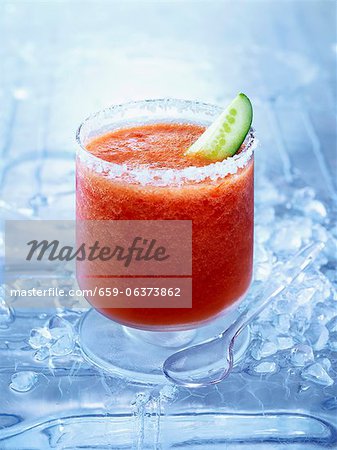 Frozen Bloody Mary with a slice of cucumber