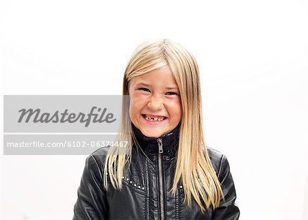 Portrait of smiling girl, studio shot