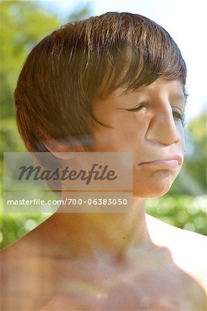 Boy with Face Pressed Against Glass