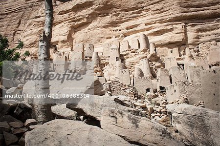 The principal Dogon area is bisected by the Bandiagara Escarpment..The Dogon are best known for their mythology, their mask dances, wooden sculpture and their architecture.