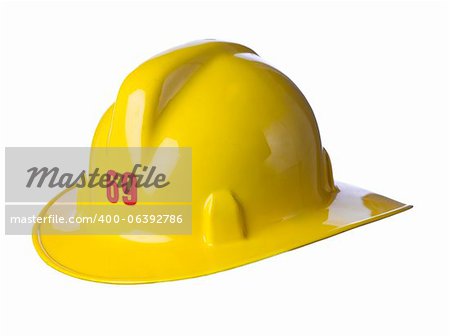 Close up image of yellow fireman helmet against white background