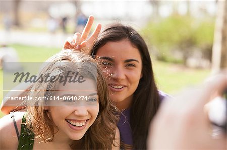 Two young women having their picture taken