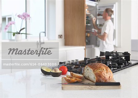 Man in kitchen, preparing food Man in kitchen, preparing food