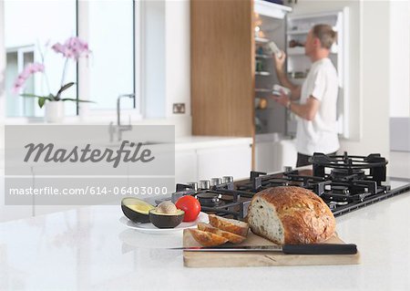 Man in kitchen, preparing food