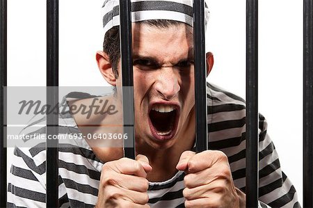 Convict yells through prison bars