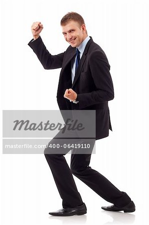 energetic young business man enjoying success against white - Isolated