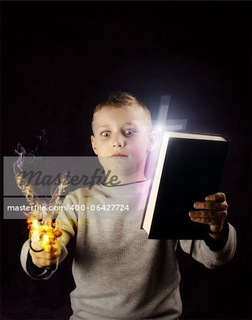 Kid looking at a slingshot on fire and trying to make a decision
